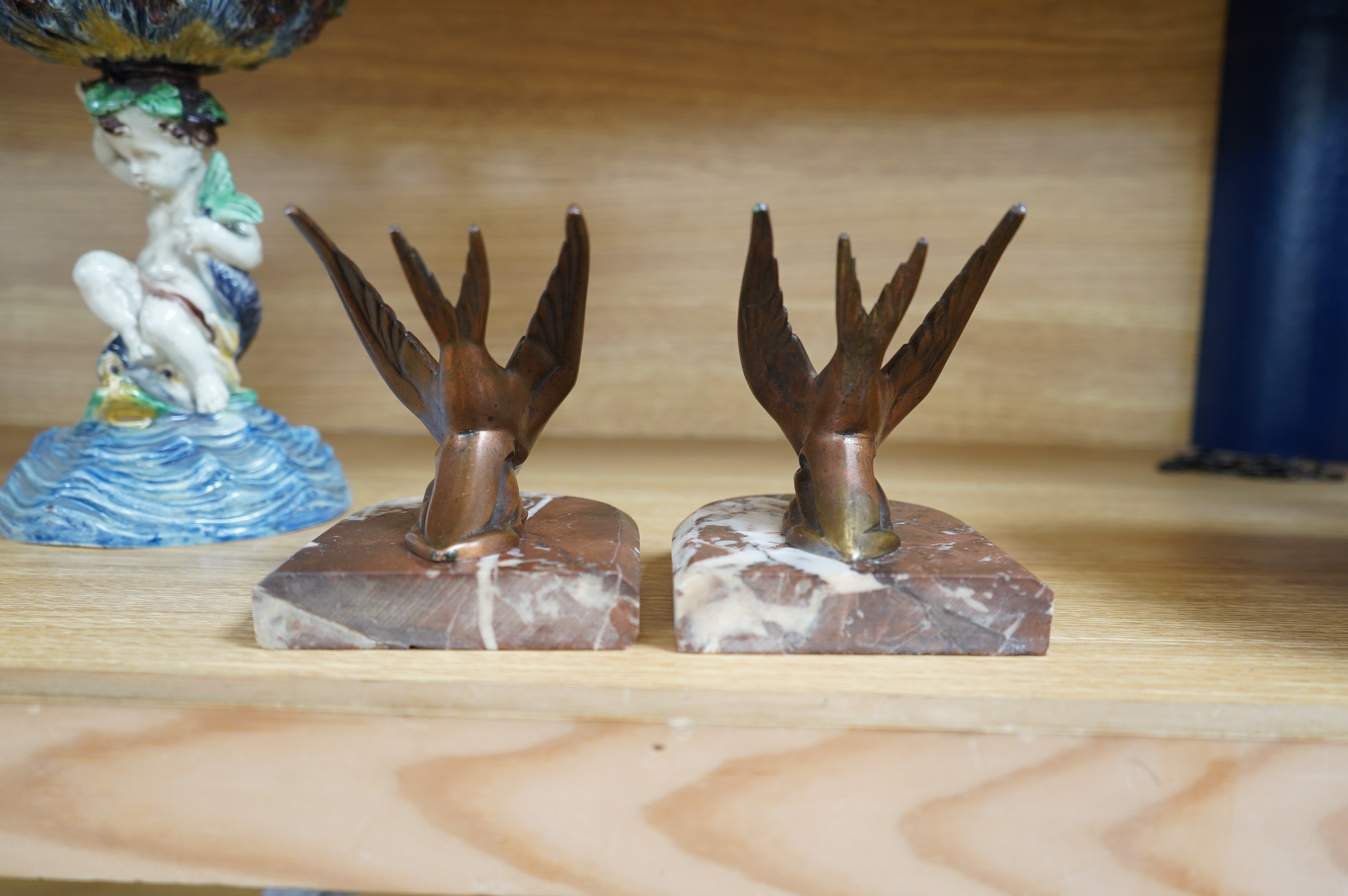 A pair of French Art Deco bronze bird bookends, 12cm. Condition - fair